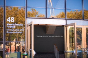 Left entrance of the building, looking at the left naming.