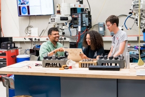 MIT Maker Czar and mechanical engineering professor Martin Culpepper works with students