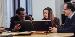 Professors share book with student