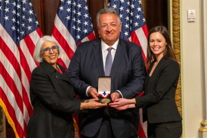 Arati Prabhakar (left) presents MIT Corporation member Noubar Afeyan PhD ’87 (center) and Hamilton Bennett with a National Medal of Technology and Innovation on behalf of their company, Moderna, which Afeyan co-founded along with MIT Institute Professor Robert Langer.