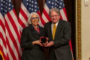 Arati Prabhakar awards R. Lawrence “Larry” Edwards ’76 the National Medal of Science on Jan. 3.