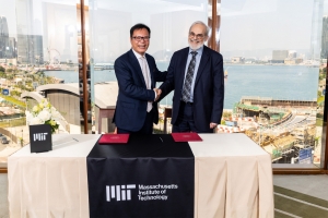 Sebastian Man ’79, SM ’80 (left) and Chancellor for Academic Advancement Eric Grimson formalize Man’s gift to the MIT Schwarzman College of Computing at a celebration in Hong Kong.
