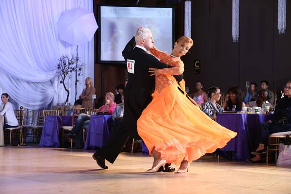 Doug Bailey and Irina (instructor) perform the Tango at the Conrad Hotel in NYC during the Empire Dance Championships competition.