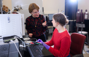 An MIT graduate student and her advisor discuss the student’s electrochemical experimentation in her lab on the MIT campus.