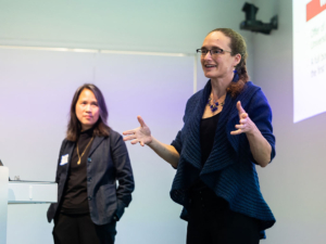 Lily Tsai and Rebecca Saxe giving a presentation