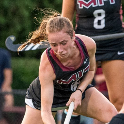 Bailey McIntyre playing field hockey